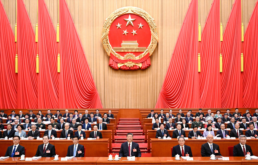 3月5日，第十四届全国人民代表大会第三次会议在北京人民大会堂开幕。党和国家领导人习近平、李强、王沪宁、蔡奇、丁薛祥、李希、韩正等出席大会。新华社记者 李学仁 摄